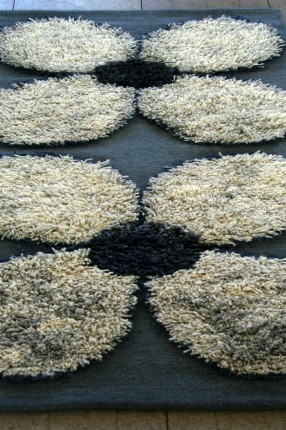 Carpet Flower with pistil. Handwoven in a technique trensaflossa. Design Elisabeth Johansson