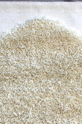 Detail of wall decoration and mufflers Recycling. Made in wool and linen. Design Elisabeth Johansson.